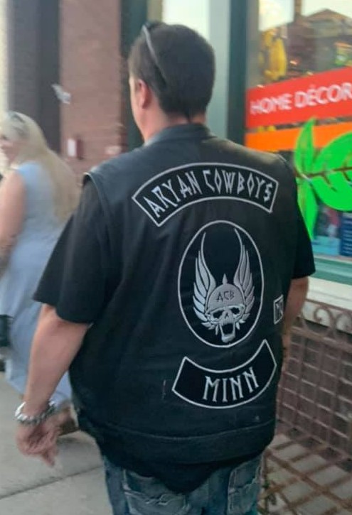 Man wearing Aryan Cowboy Brotherhood vest