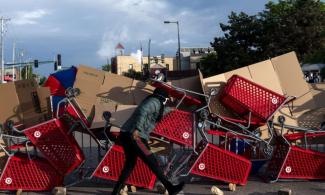 A barricade of Target-branded shopping carts.